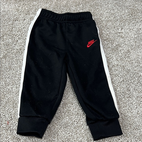 Nike Kids Black Joggers with Red and White Accents - Picture 4 of 5